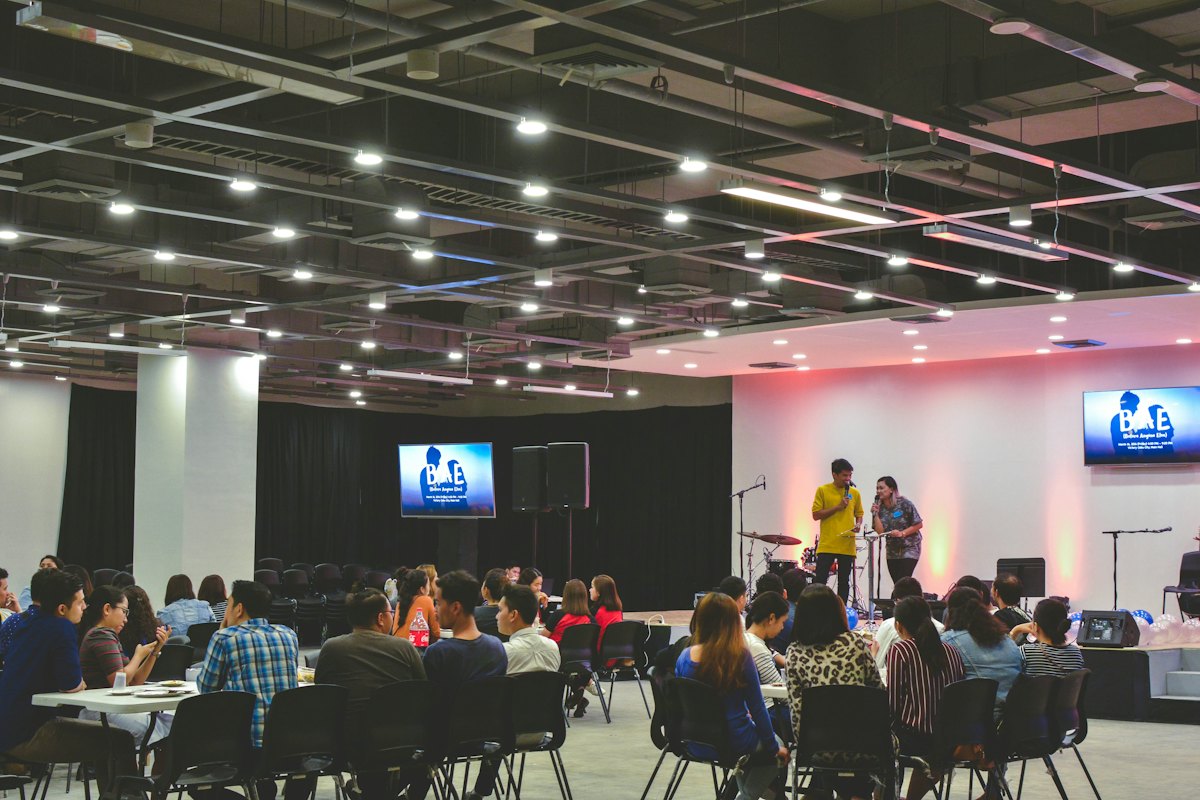 Open exhibition floor with stage and seating